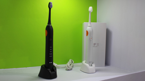 What are the advantages of using induction charging for electric toothbrushes